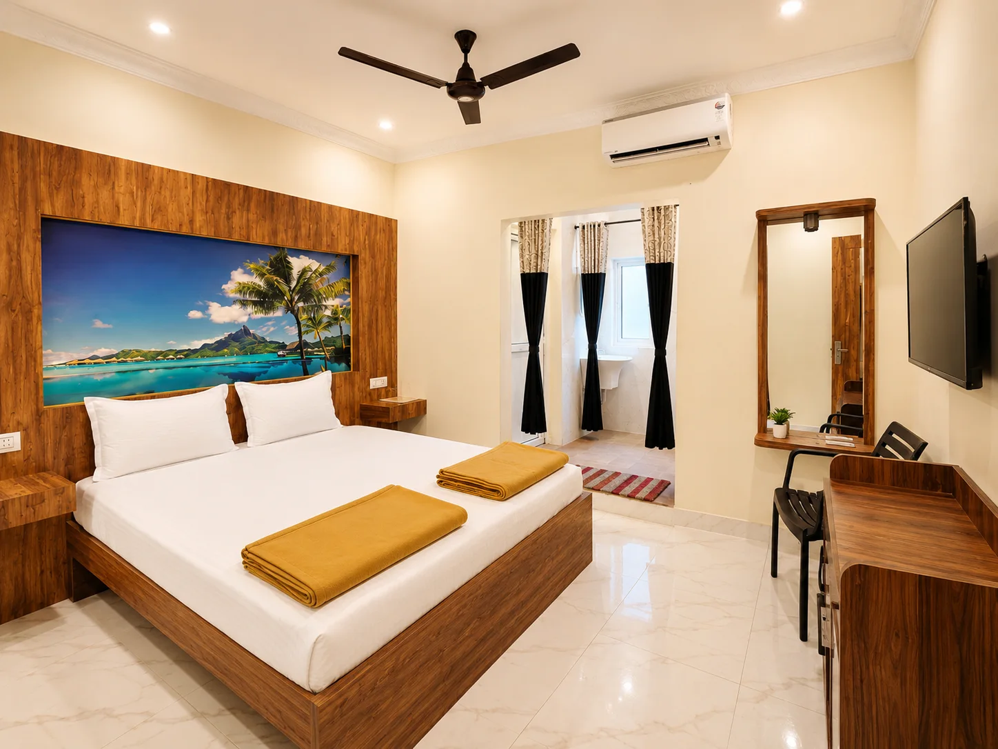 Executive double room with coastal mural and attached washroom