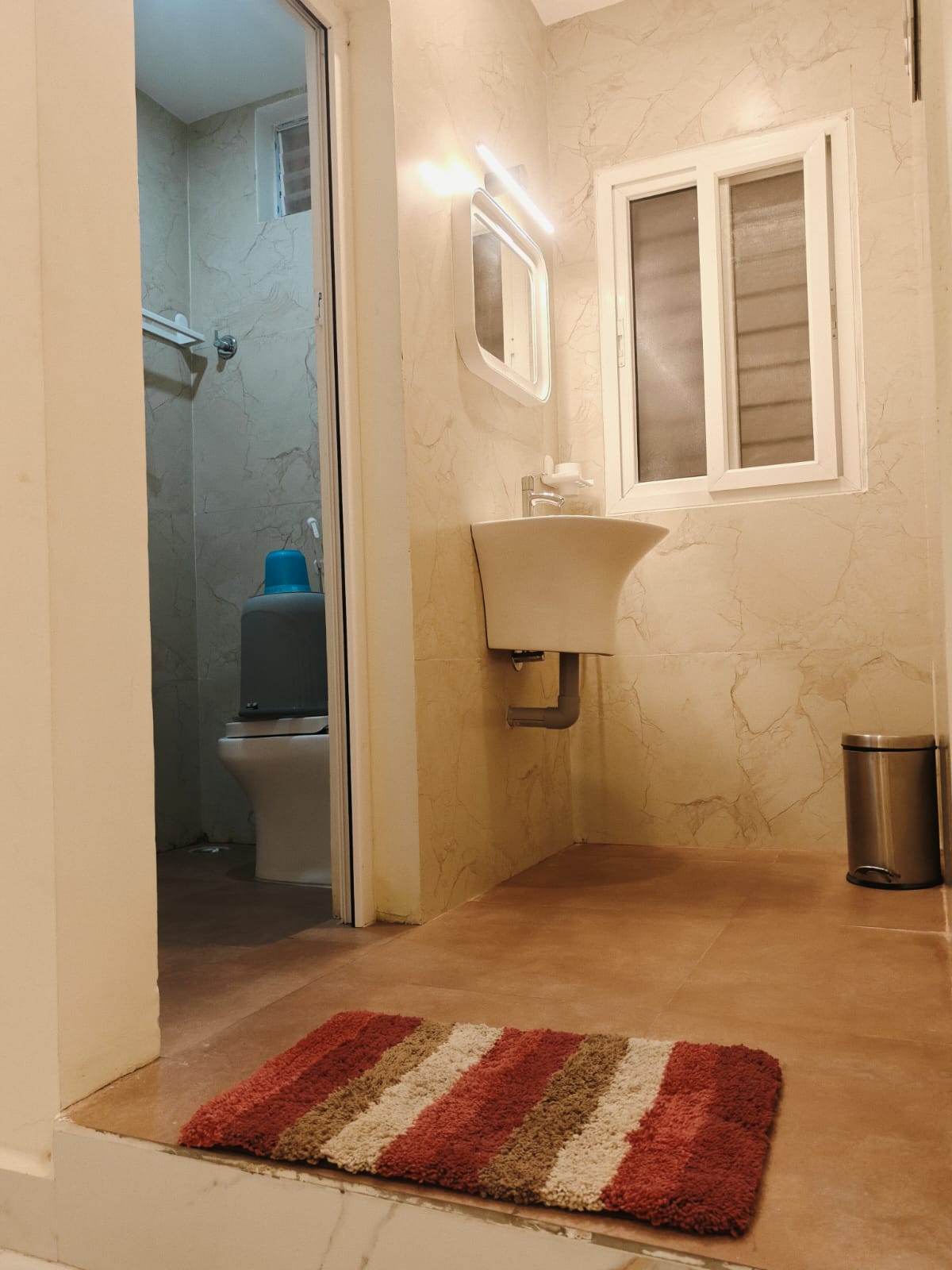 Deluxe Triple Room attached washroom vanity